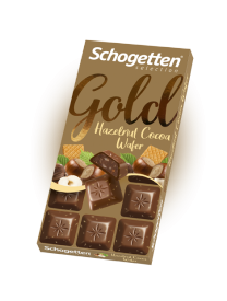 Шоколад молочный Schogetten Gold с фундуком и кусочками вафель 100 гр